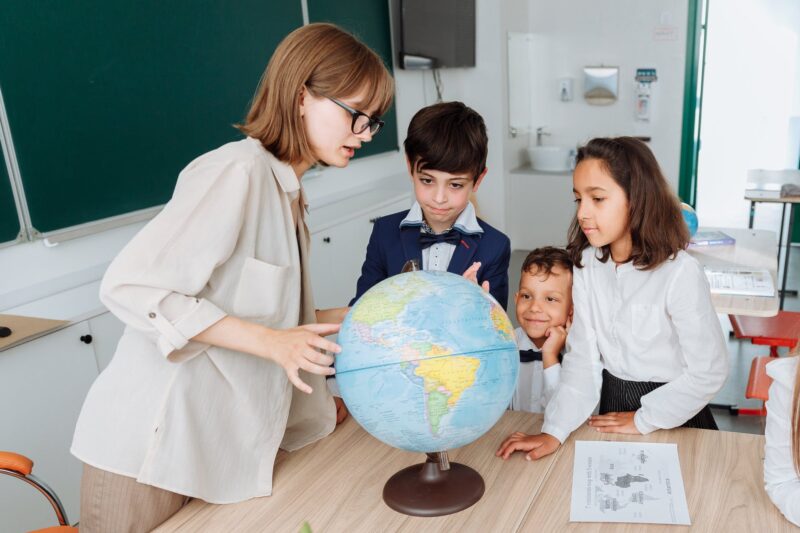 teacher discussing her lesson about geography